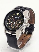 A gents Fossil watch with leather strap