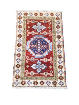 A vintage Middle Eastern rug. 164x97cm