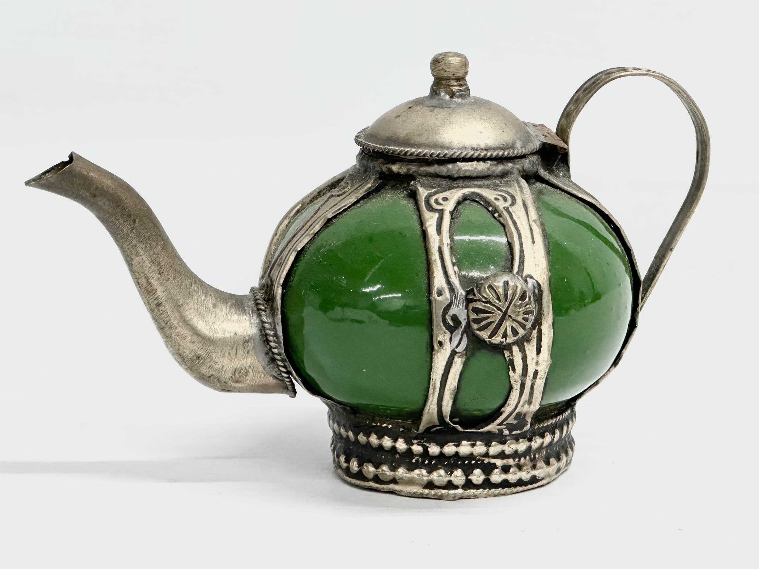 A rare early 20th century Chinese/Tibetan enamelled stoneware teapot. Circa 1900. 15x9.5cm