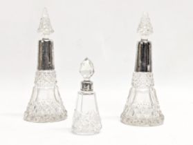 A 3 piece late 19th / early 20th century silver mounted perfume set. Pair measures 14.5cm