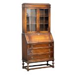 A 1930’s oak bureau bookcase. 88x40x192cm(8)