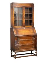 A 1930’s oak bureau bookcase. 88x40x192cm(8)