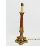 A good quality early 20th century French Empire style brass table lamp with 3 paw feet. Circa