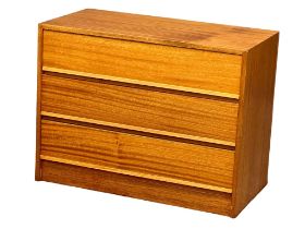 A Danish Mid Century teak chest of drawers. 1960’s. 75.5x40x58cm