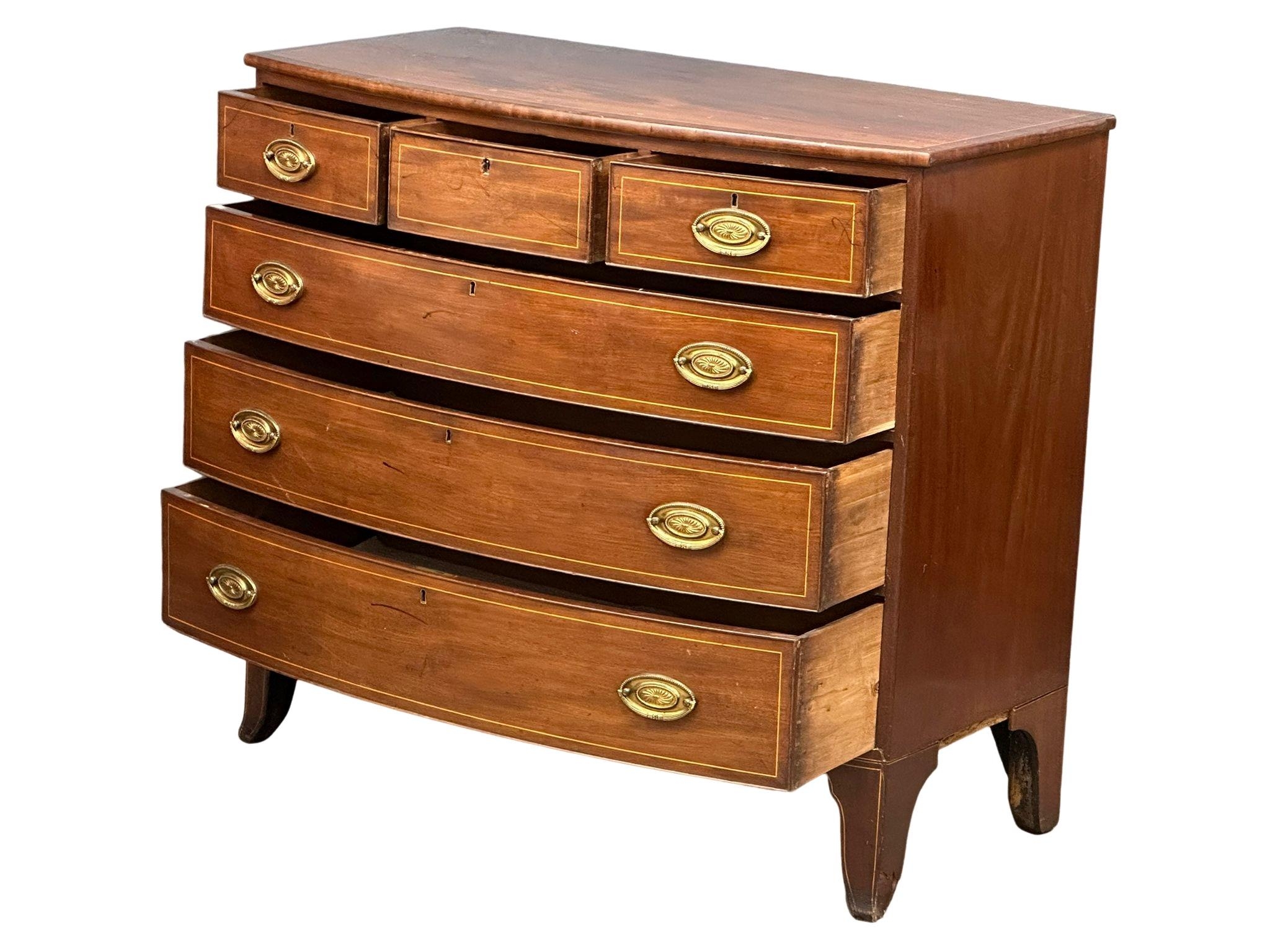 A George IV Inlaid mahogany box front chest of drawers with brass drop handles on splayed feet. - Image 7 of 8