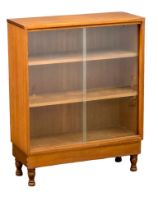 A Mid Century teak bookcase with adjustable shelves, 69cm x 28cm x 88cm