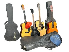 A collection of guitars and cases. Stagg, Action etc.