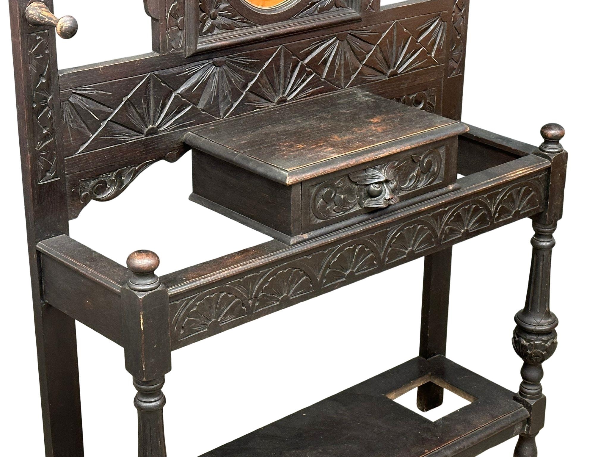 A large 19th century carved oak hallstand. Circa 1860-1880. 120x36x195cm - Image 2 of 5