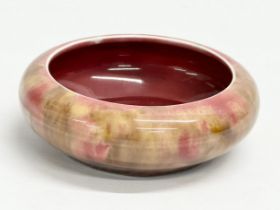 An early 20th century glazed shallow bowl. Ruskin style. 11x3.5cm
