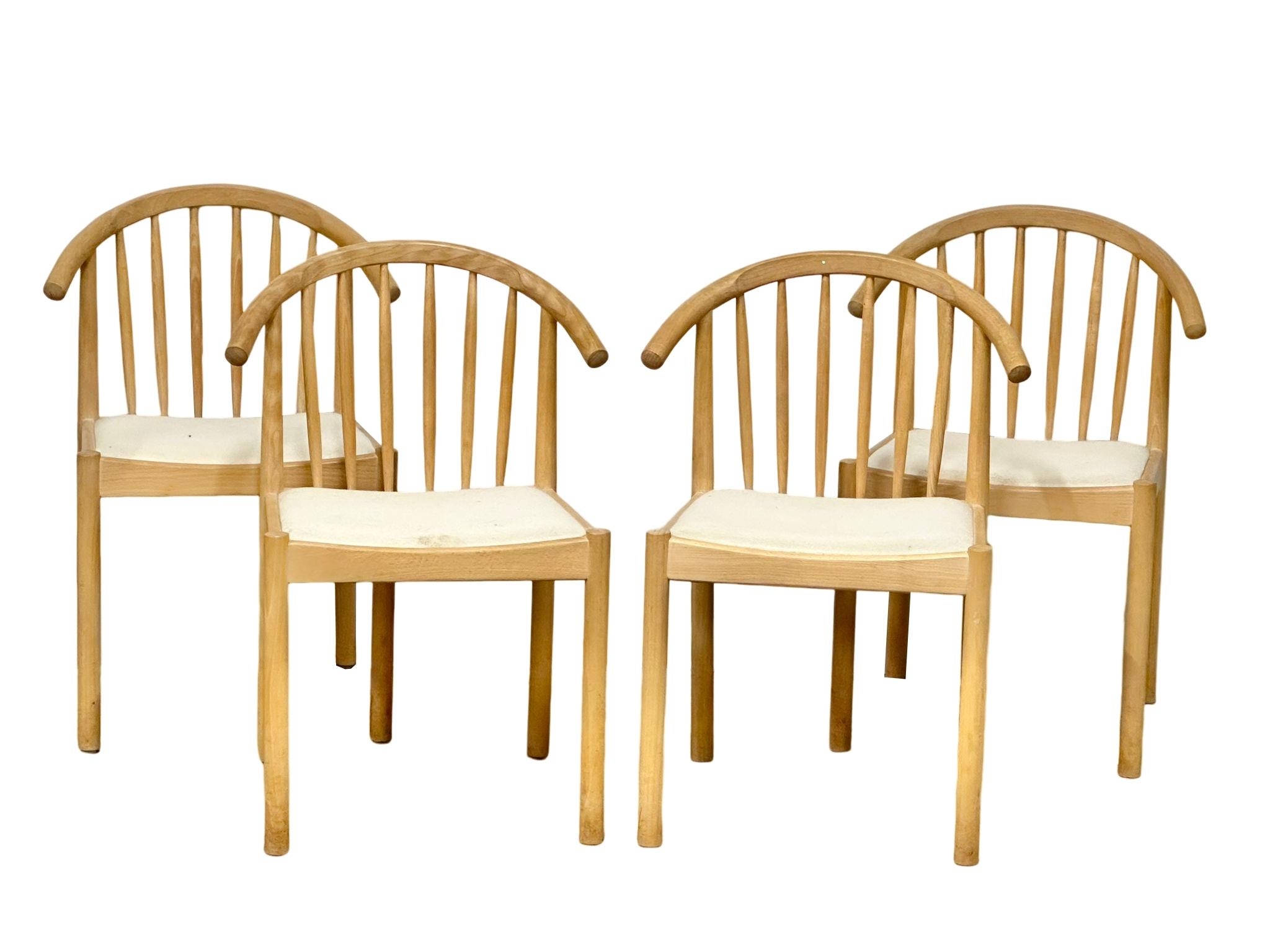 A set of 4 Danish Mid Century beech cow horn dining chairs