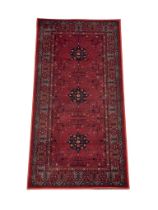 A Middle Eastern style rug. 80x160cm