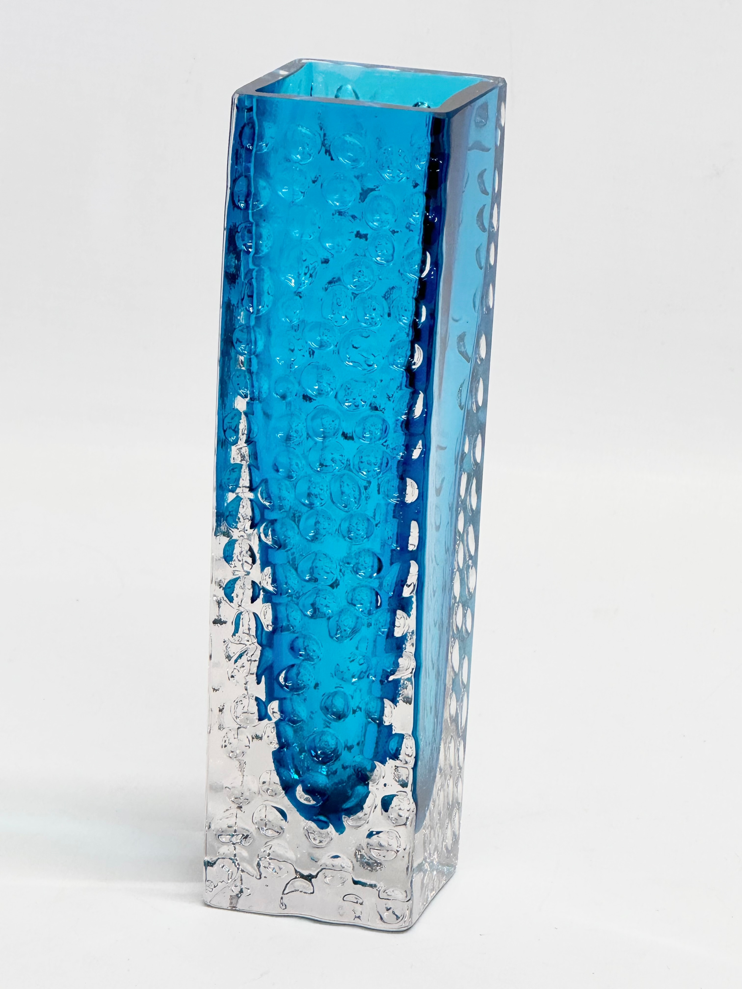 A Kingfisher Blue ‘Nailhead’ vase designed by Geoffrey Baxter for Whitefriars. 4.5x45.5x17cm.