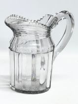 A large late Georgian/early Victorian cut glass jug. Circa 1820-1850. 22x12x20.5cm.