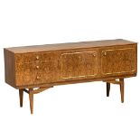 A Mid Century simulated walnut and rosewood sideboard by Beautility, 161cm x 47cm x 76cm