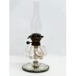 A Victorian hand blown glass bowl oil lamp on sorcerers mirror base. 20x49cm