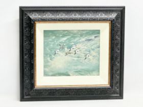 An oil painting on canvas by Michael Benington. Eiders at Sea. In an ornate shadowbox frame. 30x25.