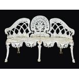 A Victorian style cast iron garden bench, 138cm