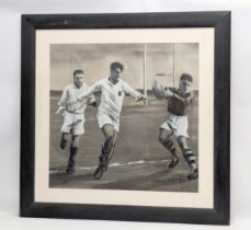 A large signed pastel drawing of rugby players. 93x90cm with frame, 67x64cm without frame