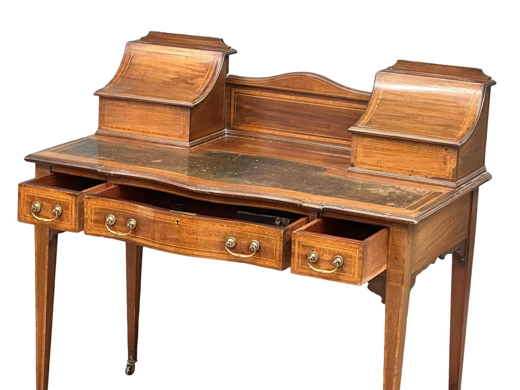 An early 20th century Sheraton Revival inlaid mahogany writing desk with leather top and 3 - Image 4 of 7