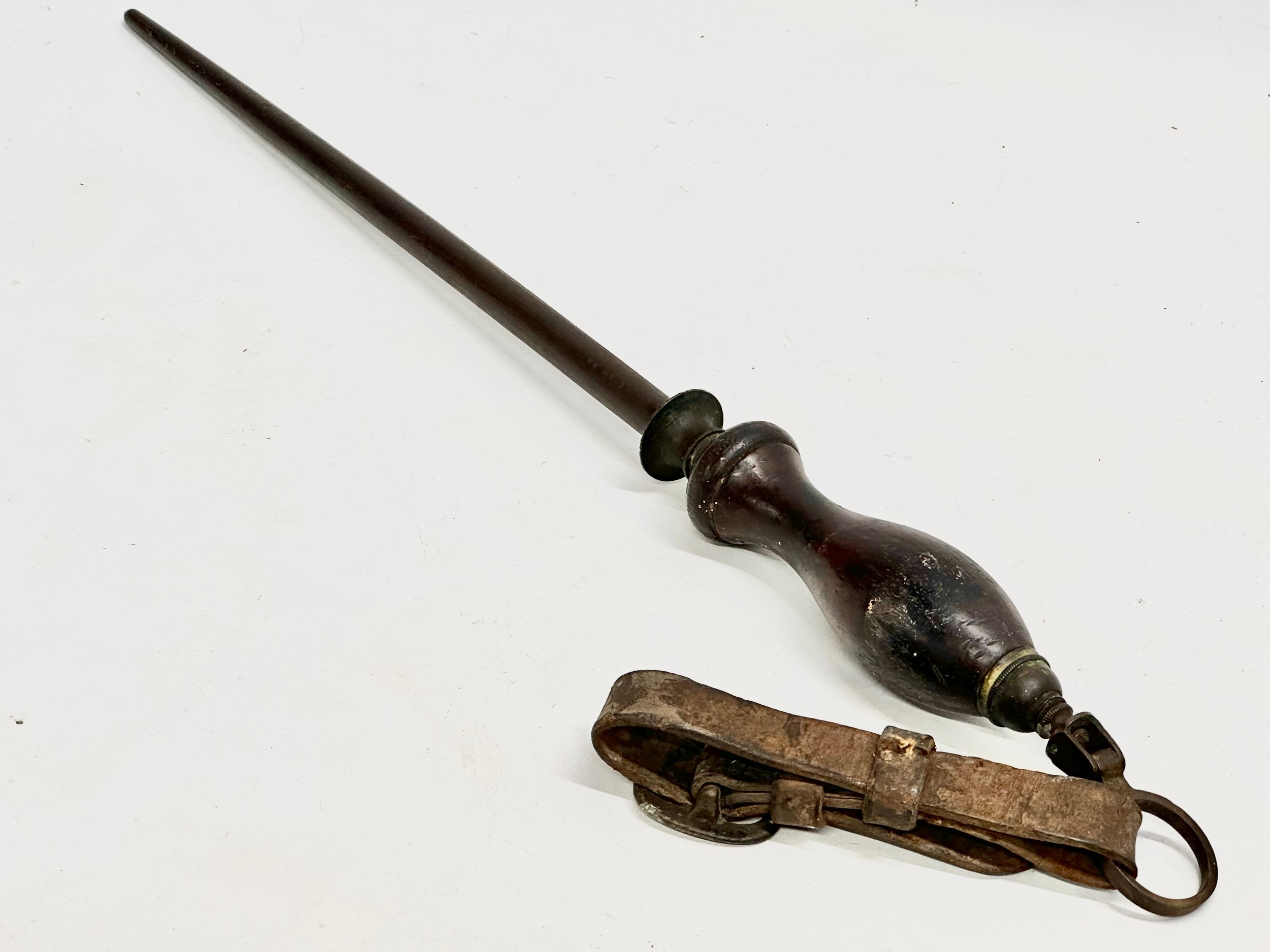 A late 19th century early Watson Bros, Glasgow knife sharpener. 48cm