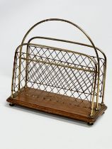 A late Victorian brass and mahogany paper rack/magazine rack. 36x15x37cm