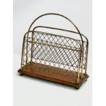 A late Victorian brass and mahogany paper rack/magazine rack. 36x15x37cm