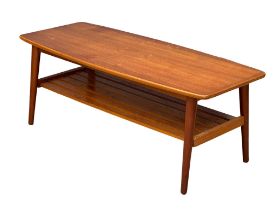 A Mid Century teak 2 tier coffee table. 104x44x40cm