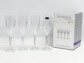 A set of 4 Waterford Marquis ‘Sparkle’ champagne flute glasses with box. 24cm