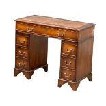 A small proportioned Georgian style mahogany pedestal desk with leather top, 91.5cm x 46cm x 76cm