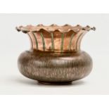 Christopher Dresser. An early 20th century copper jardiniere designed by Christopher Dresser for