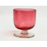 A 19th century Cranberry gin glass. Circa 1820-1850. 7.5x8.5cm