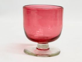 A 19th century Cranberry gin glass. Circa 1820-1850. 7.5x8.5cm