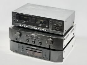 Vintage stereo system. Marantz Integrated Amplifier PM6005. A Marantz CD Plater CD6005. A Kenwood