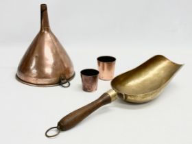 A Victorian copper wine funnel and a Victorian brass flour scoop/grain scoop. 43cm