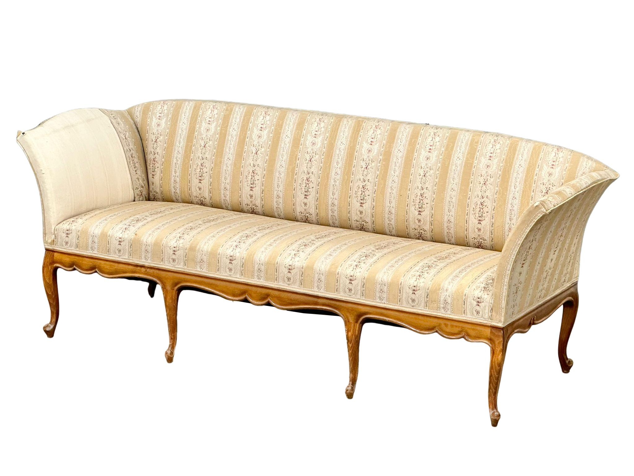 A good quality French Louis XV style chateau sofa on cabriole legs. 196x66x79cm