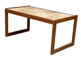 A Danish Mid Century teak coffee table with tilled top. 85x47x40cm