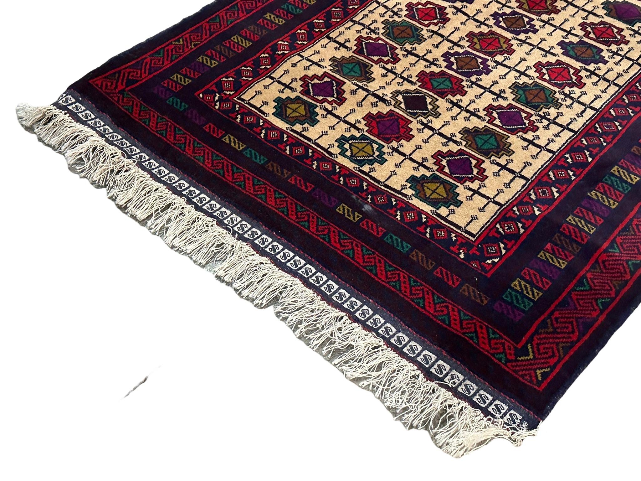 A vintage hand knotted Afghan rug. 104x210cm - Image 3 of 5