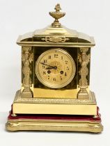 A late 19th century French brass mantle clock on stand. L. Marti Medaille D’Argent 1889. With key