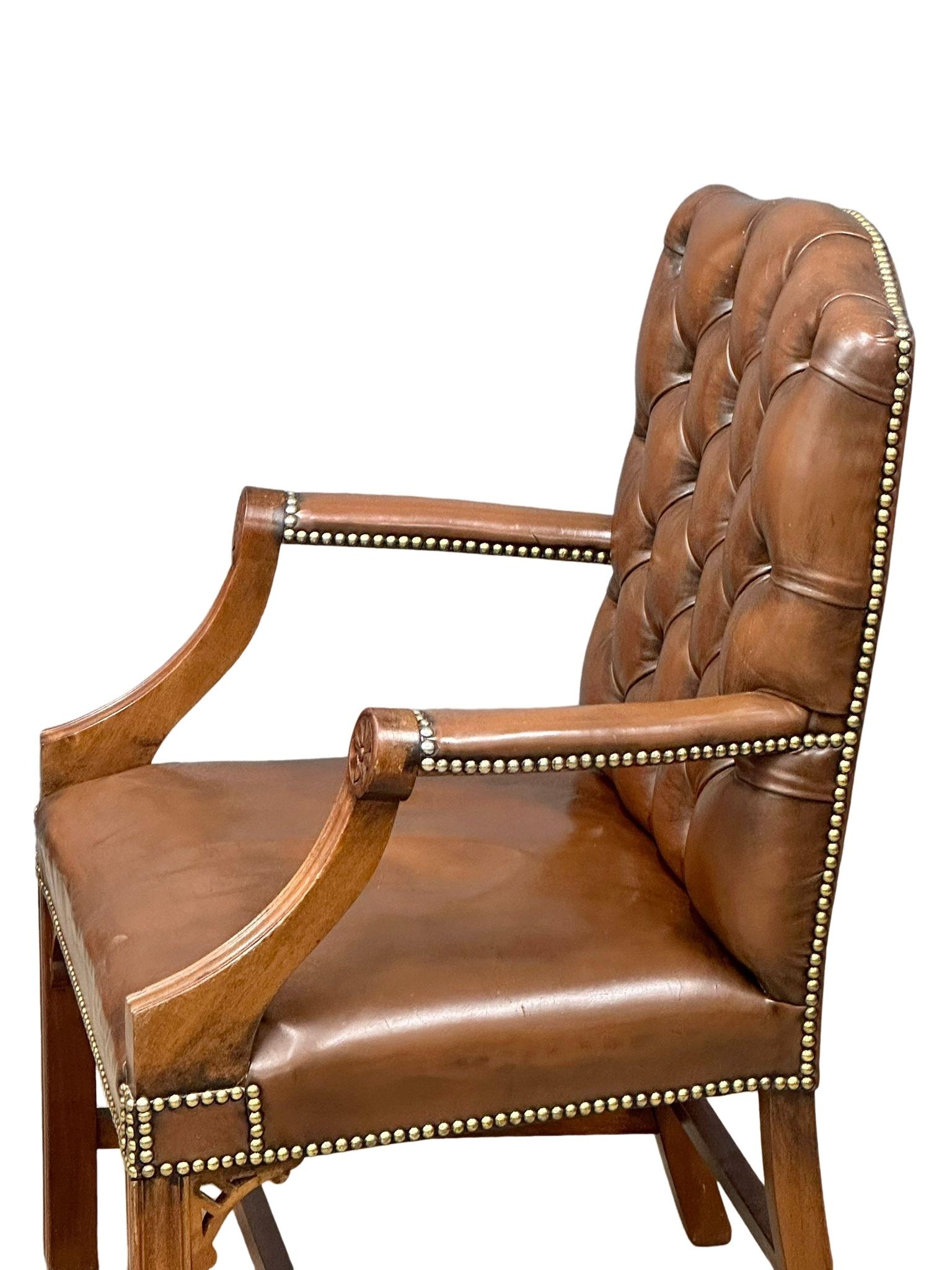 An 18th Century style deep button leather armchair with brass studs. In the Gainsborough/Chinese - Image 15 of 16