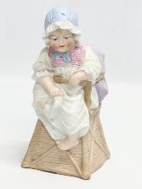 A late 19th century Heubach bisque figurine. 17cm