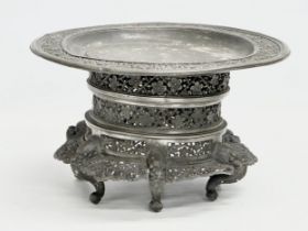 A 19th century Burmese pierced Pewter stand, raised on 6 feet. Circa 1820-1860. 23x14cm