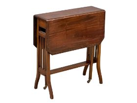 An Edwardian Inlaid mahogany Sutherland table