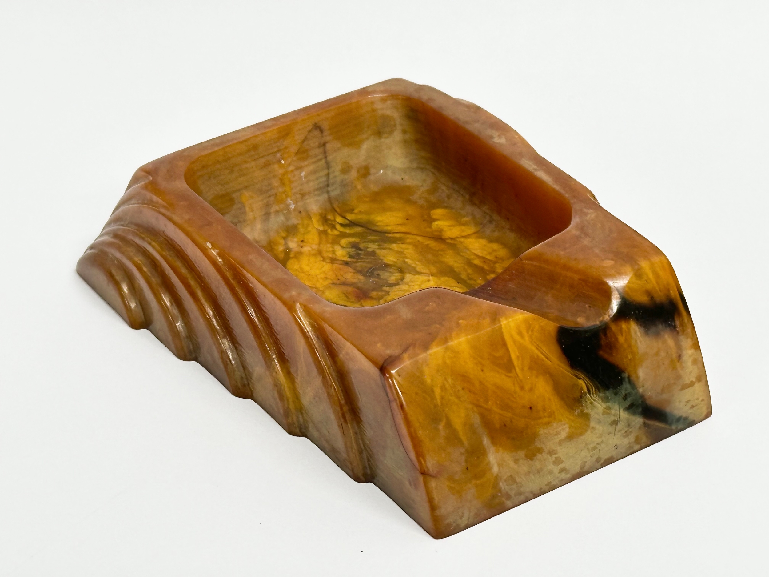 An Art Deco Butterscotch Phenolic Bakelite ashtray by Carvacraft. A Dickenson Product. 8x10cm - Image 2 of 4