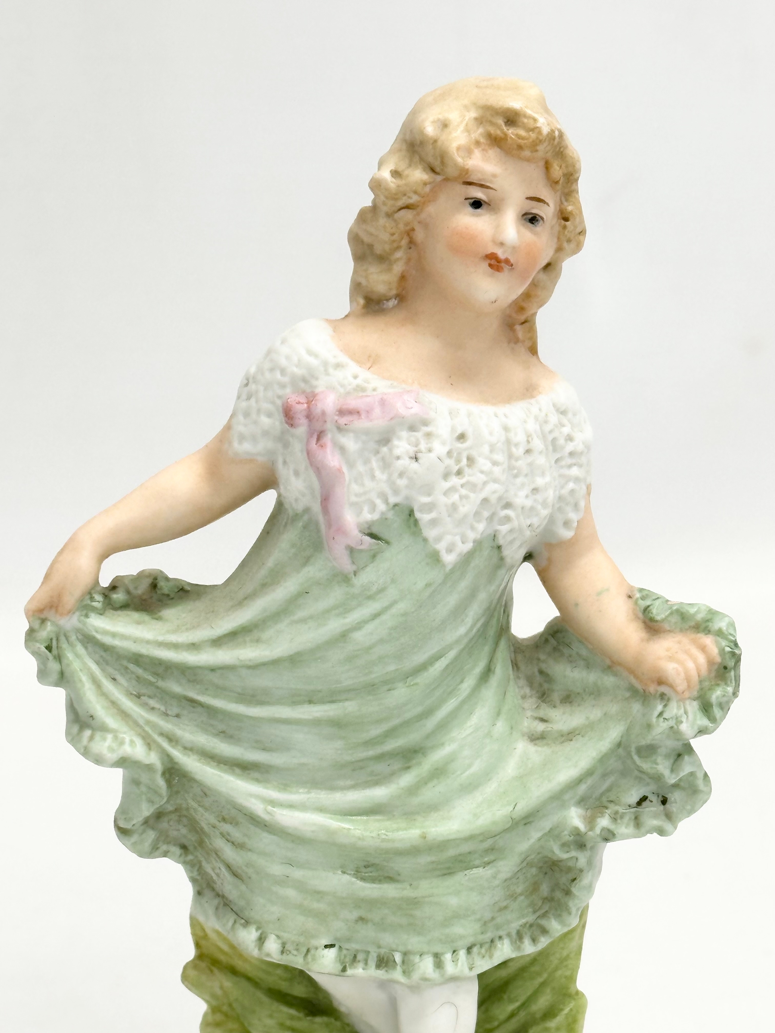 A late 19th century Heubach bisque figurine. 17cm - Image 2 of 4