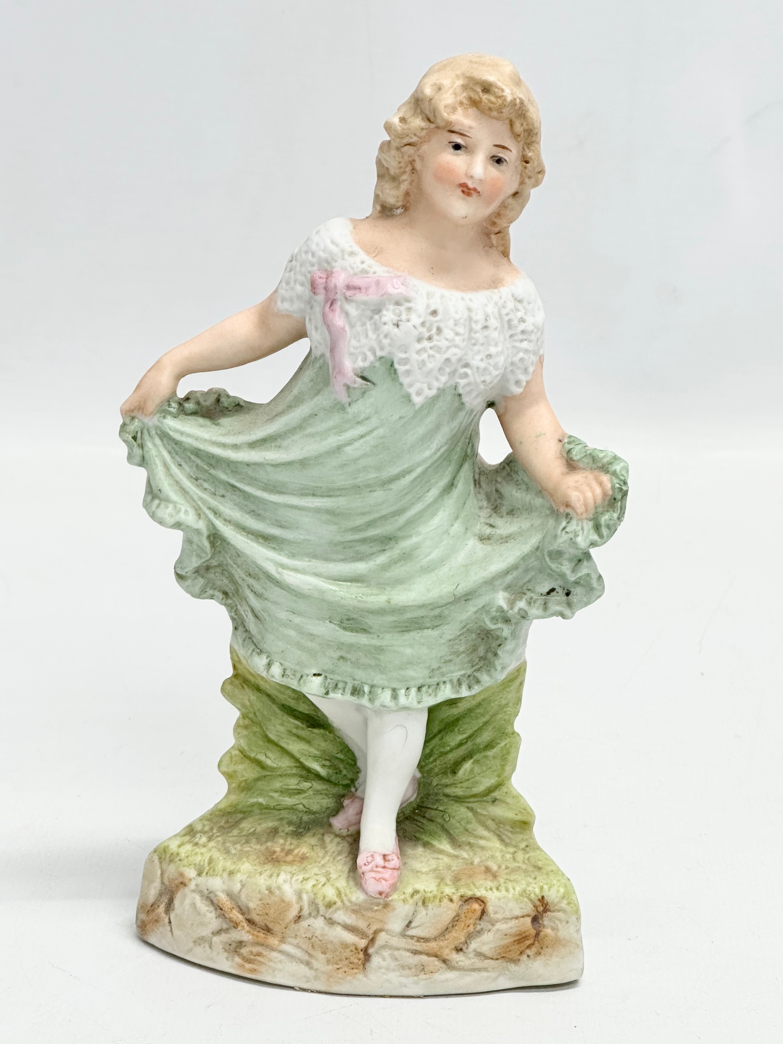 A late 19th century Heubach bisque figurine. 17cm