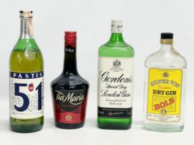 4 bottles of alcohol. Gordon’s Dry Gin 1L, Silver Top Distilled Dry Gin 1L, Pastis Pernod 51 1L, Tia