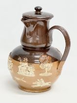 A Royal Doulton Lambeth ‘Harvest’ flagon with spout and sieve. Early 20th century. 17x15x25cm