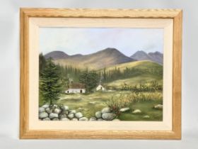 A large oil painting by Angie. Cottage on the Mountains. 61x45cm. Frame 77x62cm