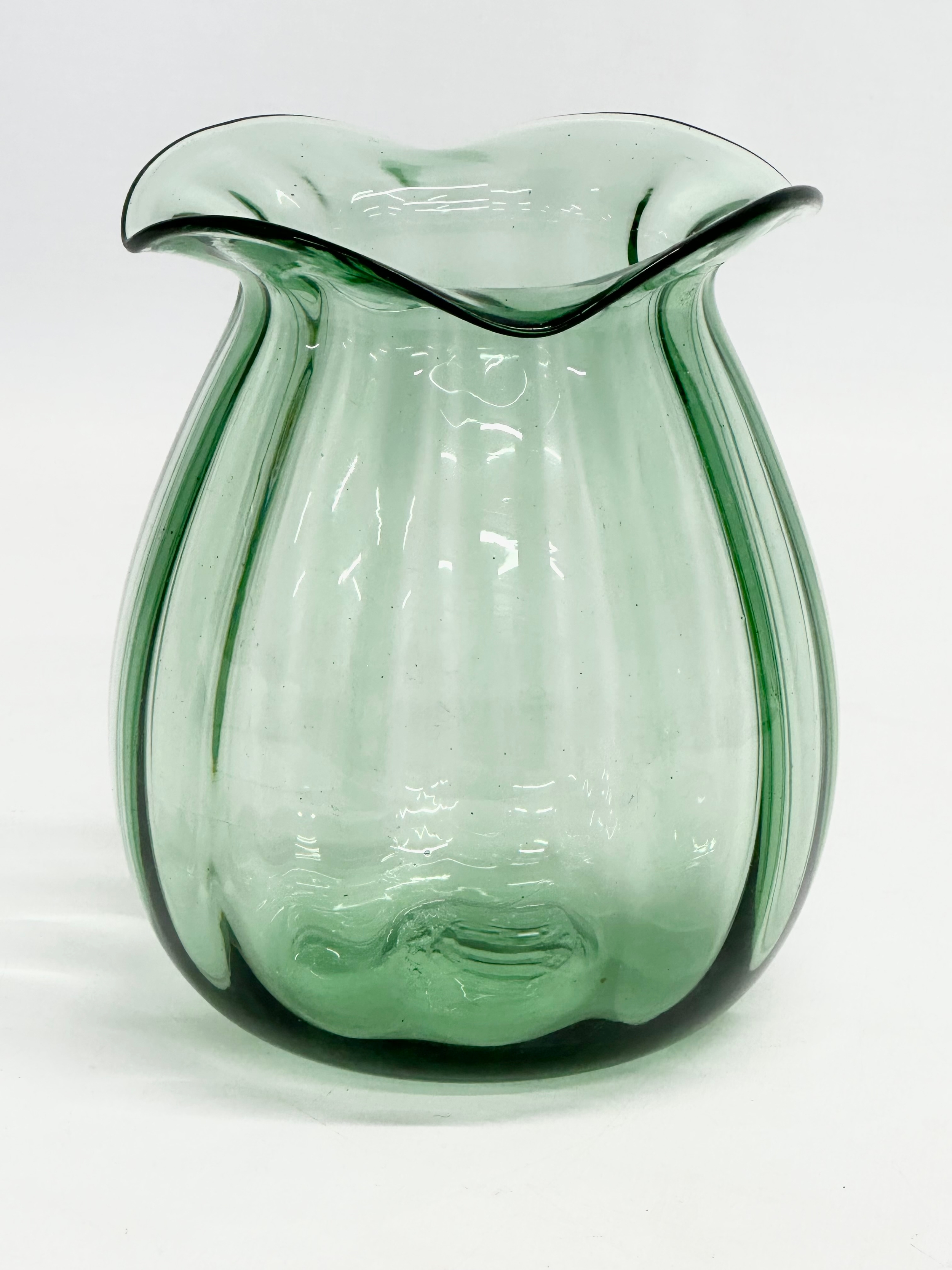 A 1930’s Art Glass vase with frilled rim. 11x13.5cm