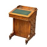 A Victorian Inlaid walnut Davenport desk with leather top and maple interior. Circa 1860-70.